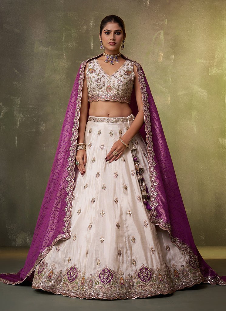 White And Purple Heavy Embroidered Wedding Lahenga Choli.