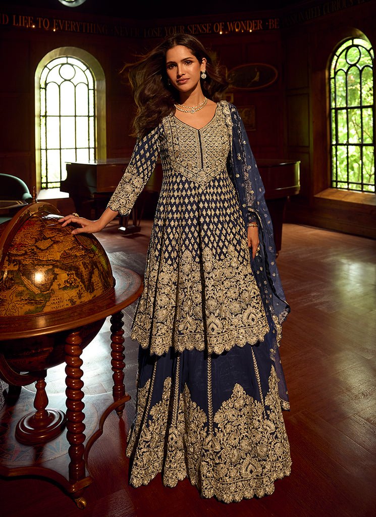 Blue Heavy Embroidered Kurti And Lahenga Choli.