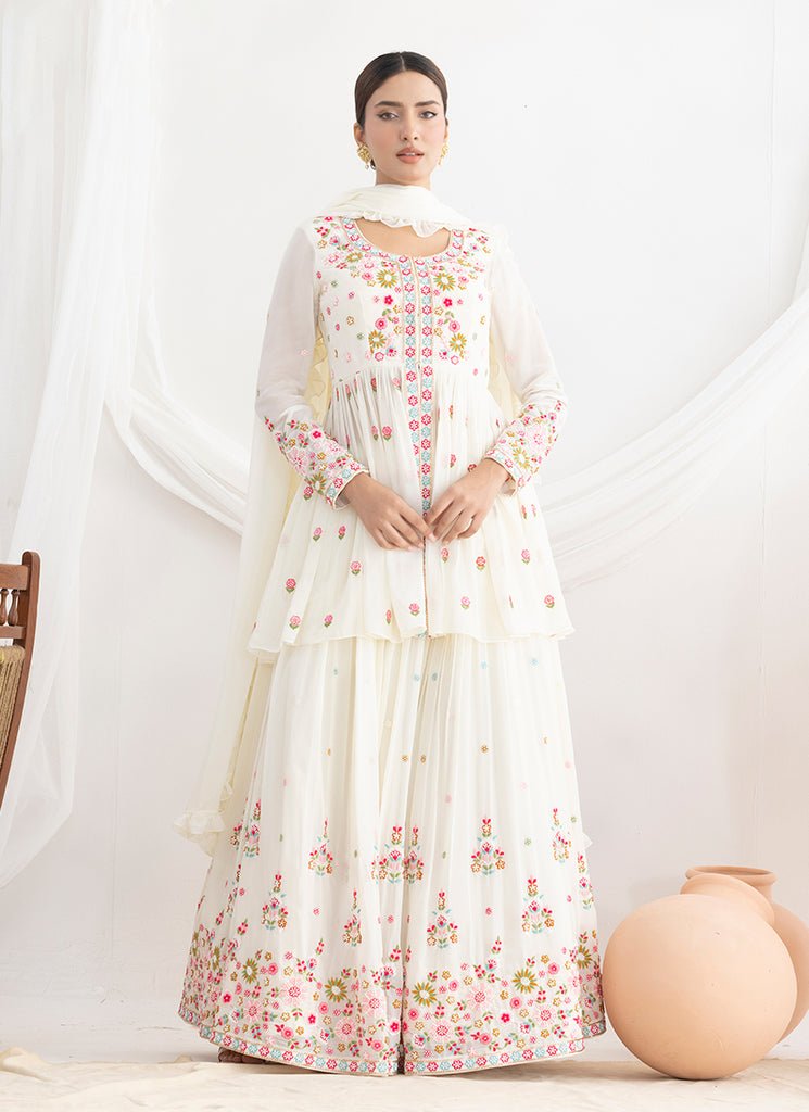 White Heavy Embroidered Stylish Partywear Anarkali Lahenga Dress.