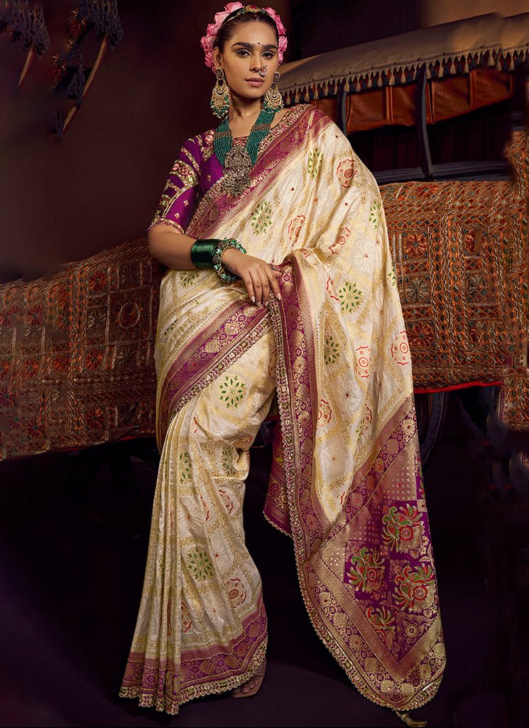 Off-white And Purple Heavy Embroidered Silk Saree