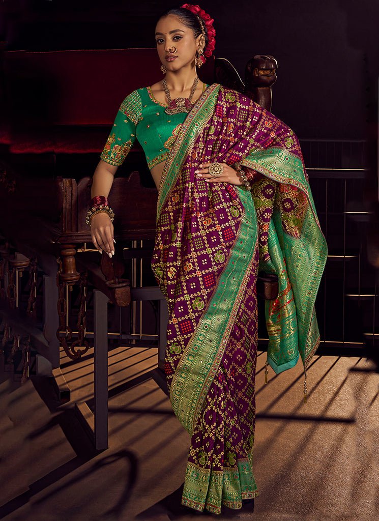 Wine And Green Heavy Embroidered Silk Saree