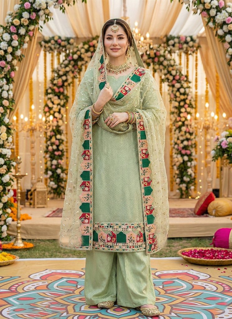 Light Green Heavy Embroidered Partywear Palazzo Style Dress.