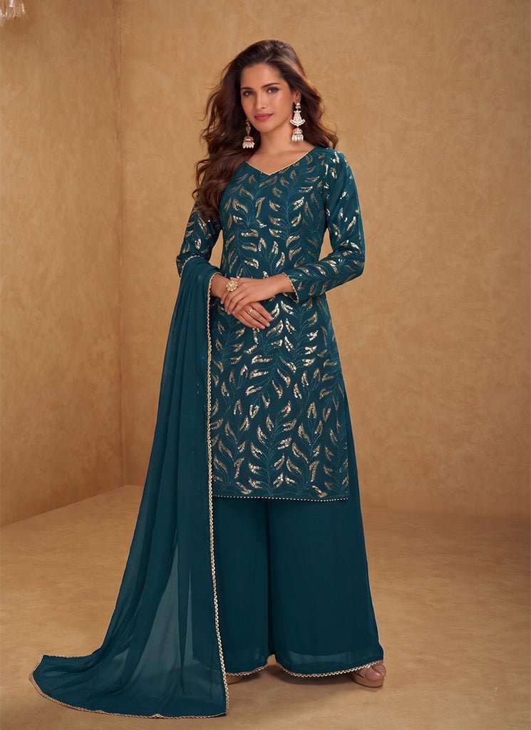 Turquoise Green Heavy Embroidered Partywear Palazzo Style Dress.