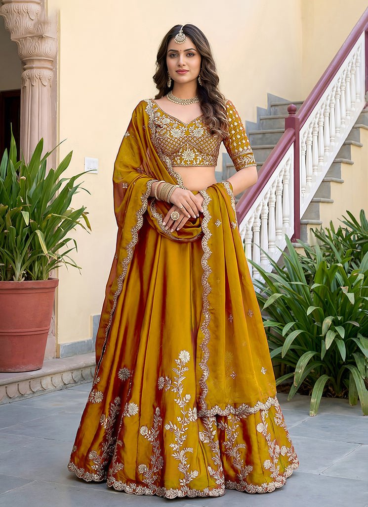 Mustard Yellow Heavy Embroidered PartyWear Silk Lehenga Choli