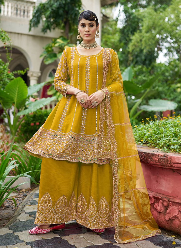 Yellow Heavy Embroidered Partywear Sharara Style Anarkali Dress.