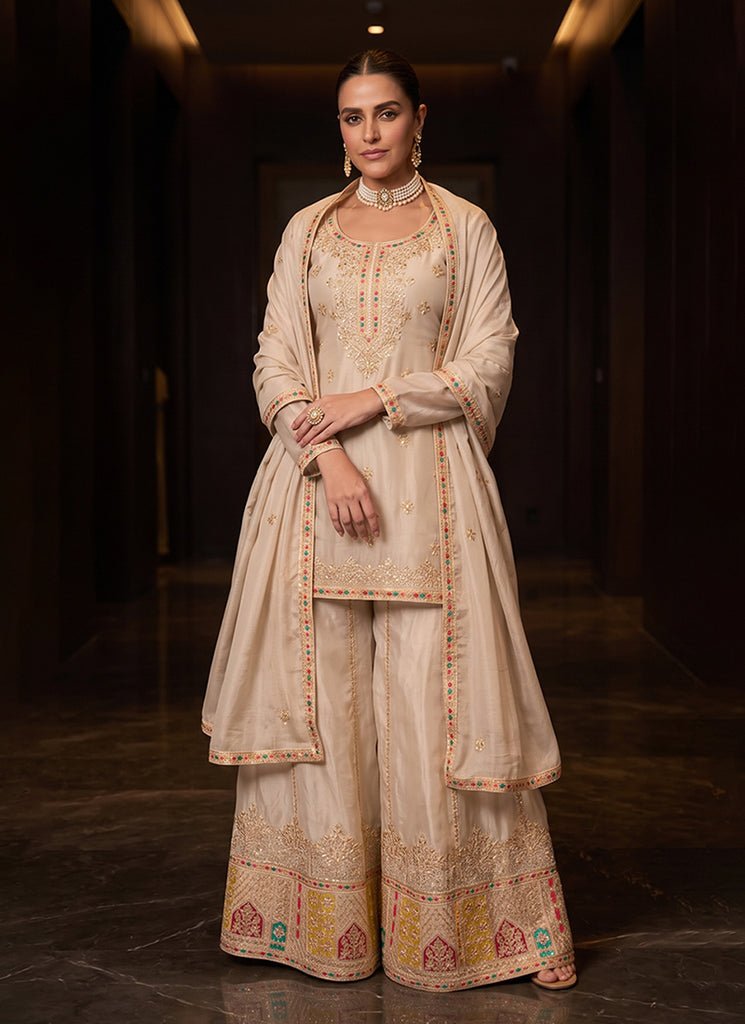 Beige Heavy Embroidered Partywear Sharara Style Dress.