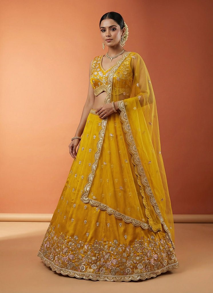 Yellow Multicolored Heavy Embroidered Georgette Lehenga Choli